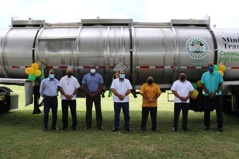 HANDING OVER TRUCK AND WATER BOWSER
